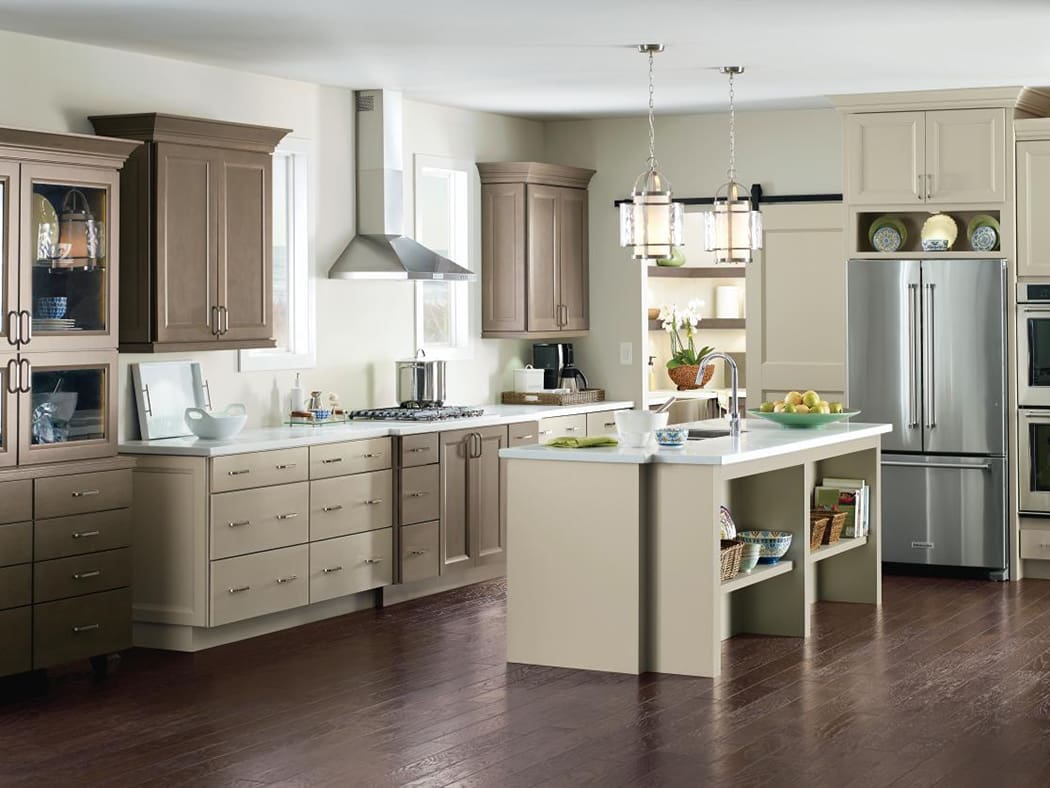 Nice cream colored kitchen with dark wood floor